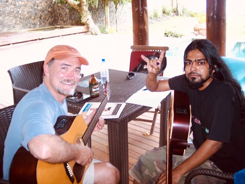 Gary with guitar student in FIJI
